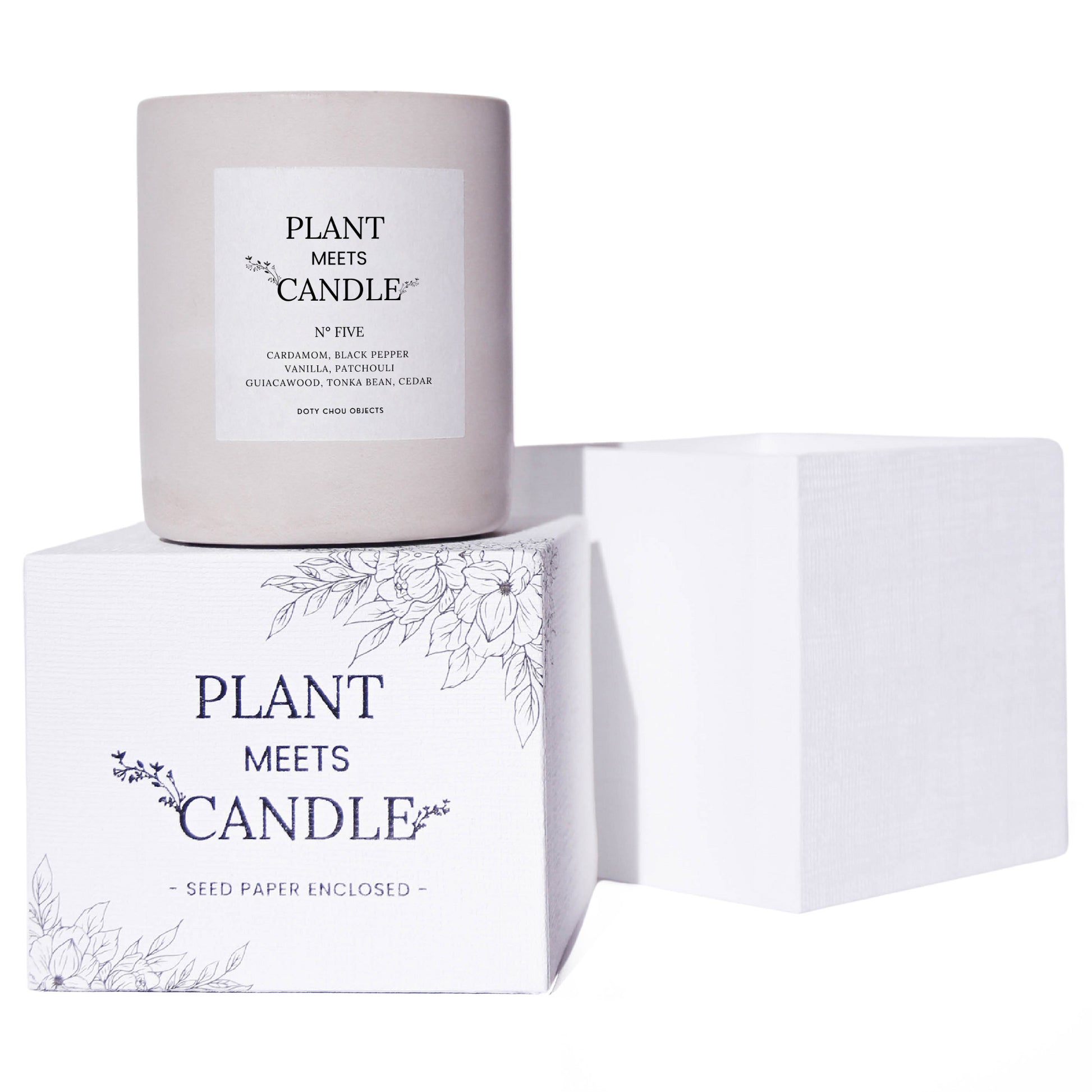 Light grey concrete candle vessel for Scent No. Five is displayed atop the Plant Meets Candle product box.