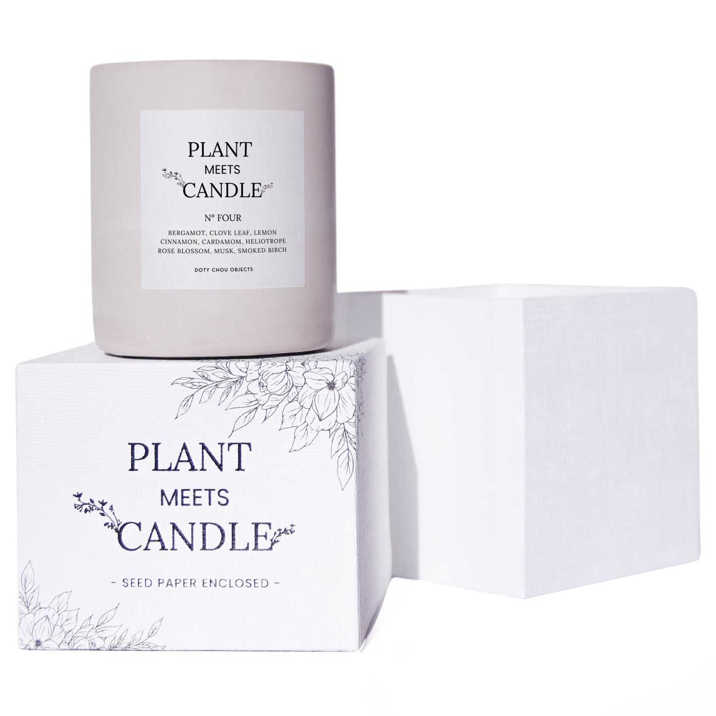 Light grey concrete candle vessel for Scent No. Four is displayed atop the Plant Meets Candle product box.