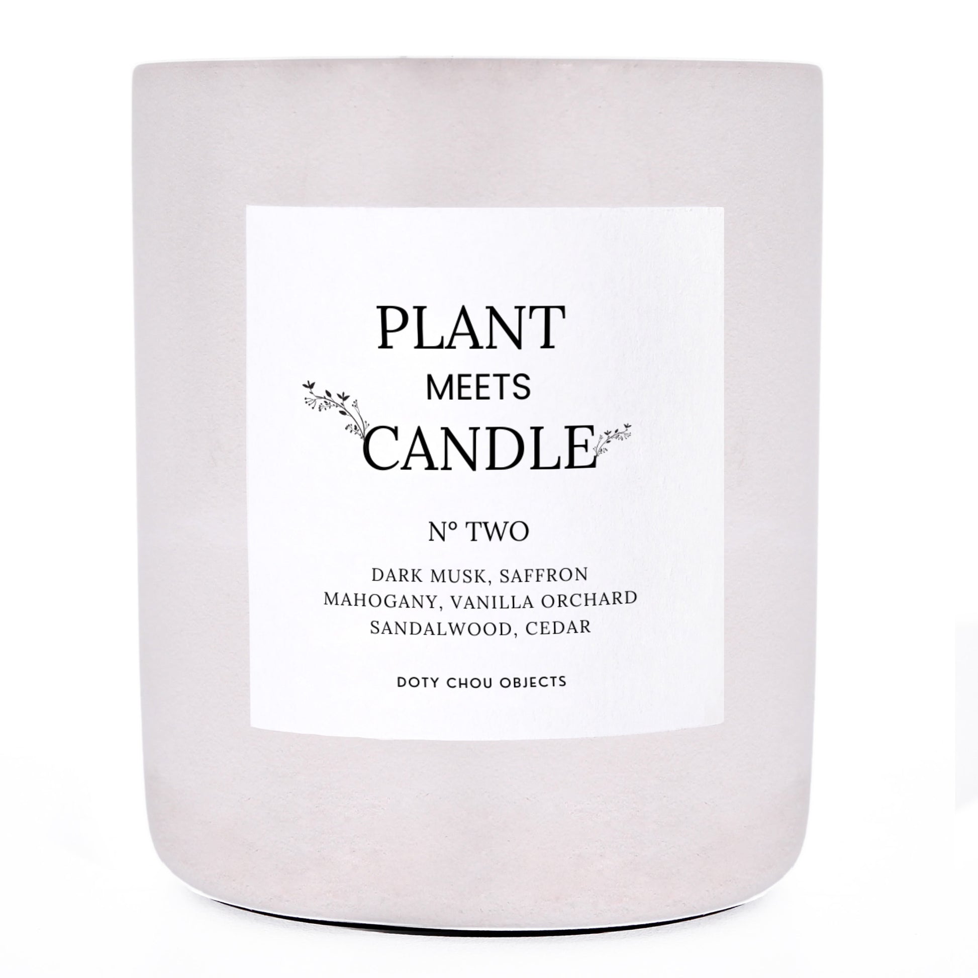 A light grey concrete candle vessel labelled as Plant Meets Candle No. Two.